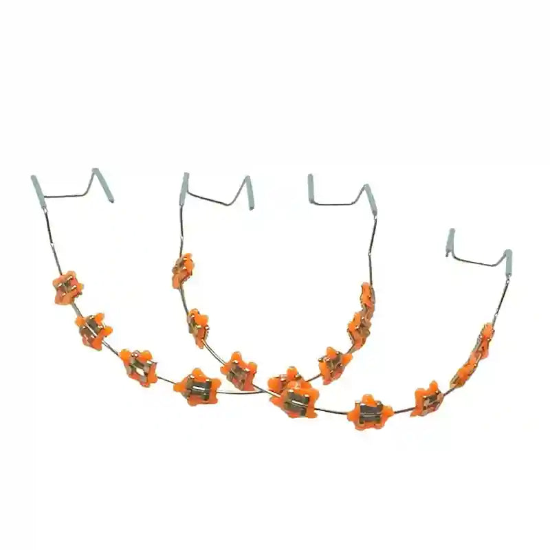 Wearing colorful fake braces for a fun, fashionable look at a photoshoot or party.