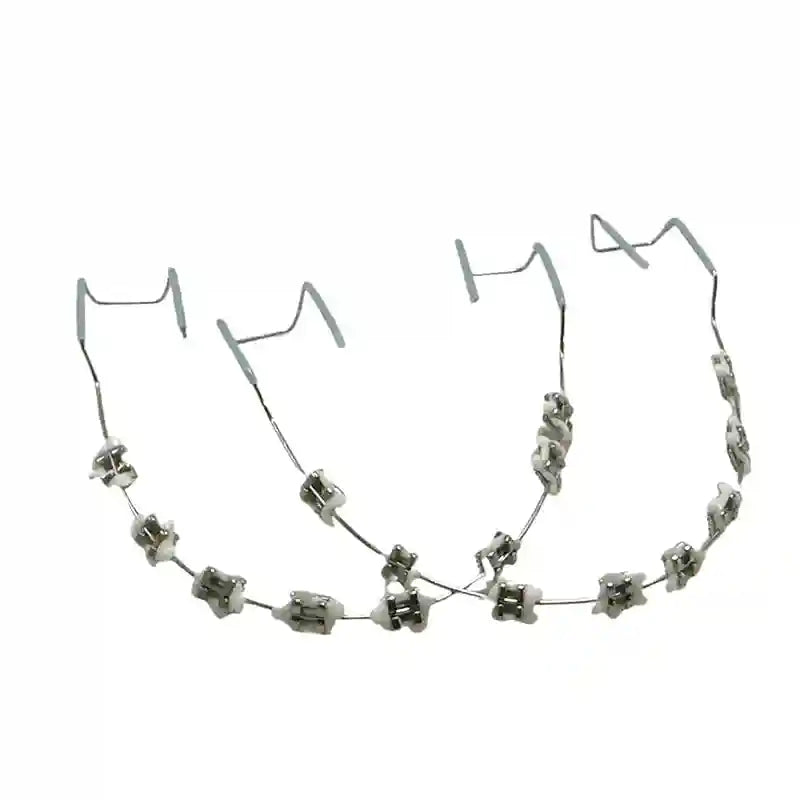 Wearing colorful fake braces for a fun, fashionable look at a photoshoot or party.