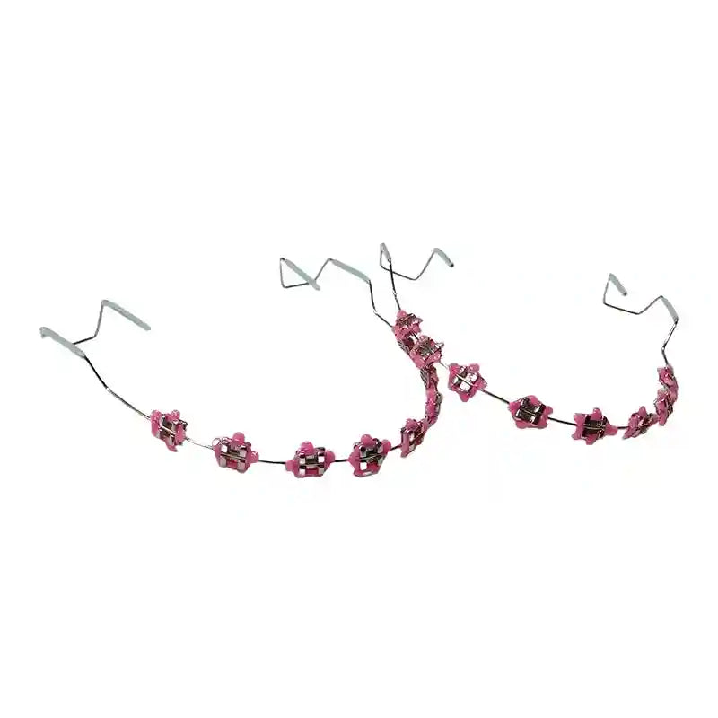 Wearing colorful fake braces for a fun, fashionable look at a photoshoot or party.