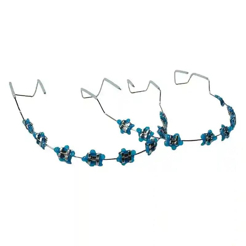 Wearing colorful fake braces for a fun, fashionable look at a photoshoot or party.