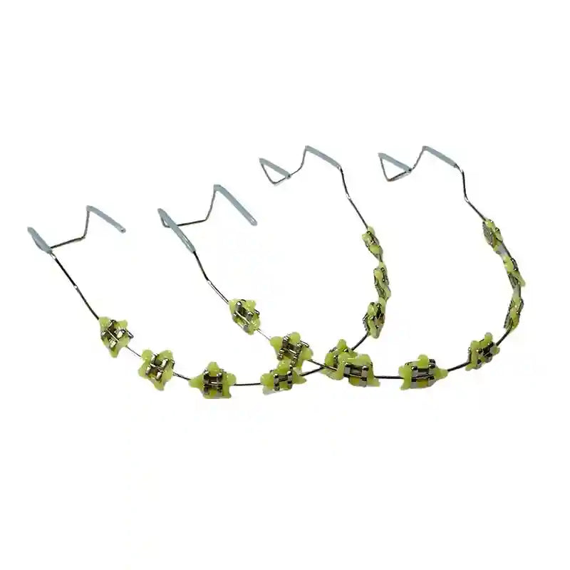 Wearing colorful fake braces for a fun, fashionable look at a photoshoot or party.