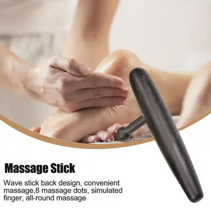 Professional massage therapist using the deep tissue tool to relieve tension in a client’s back.