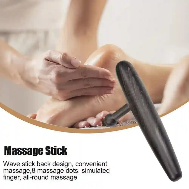 Professional massage therapist using the deep tissue tool to relieve tension in a client’s back.