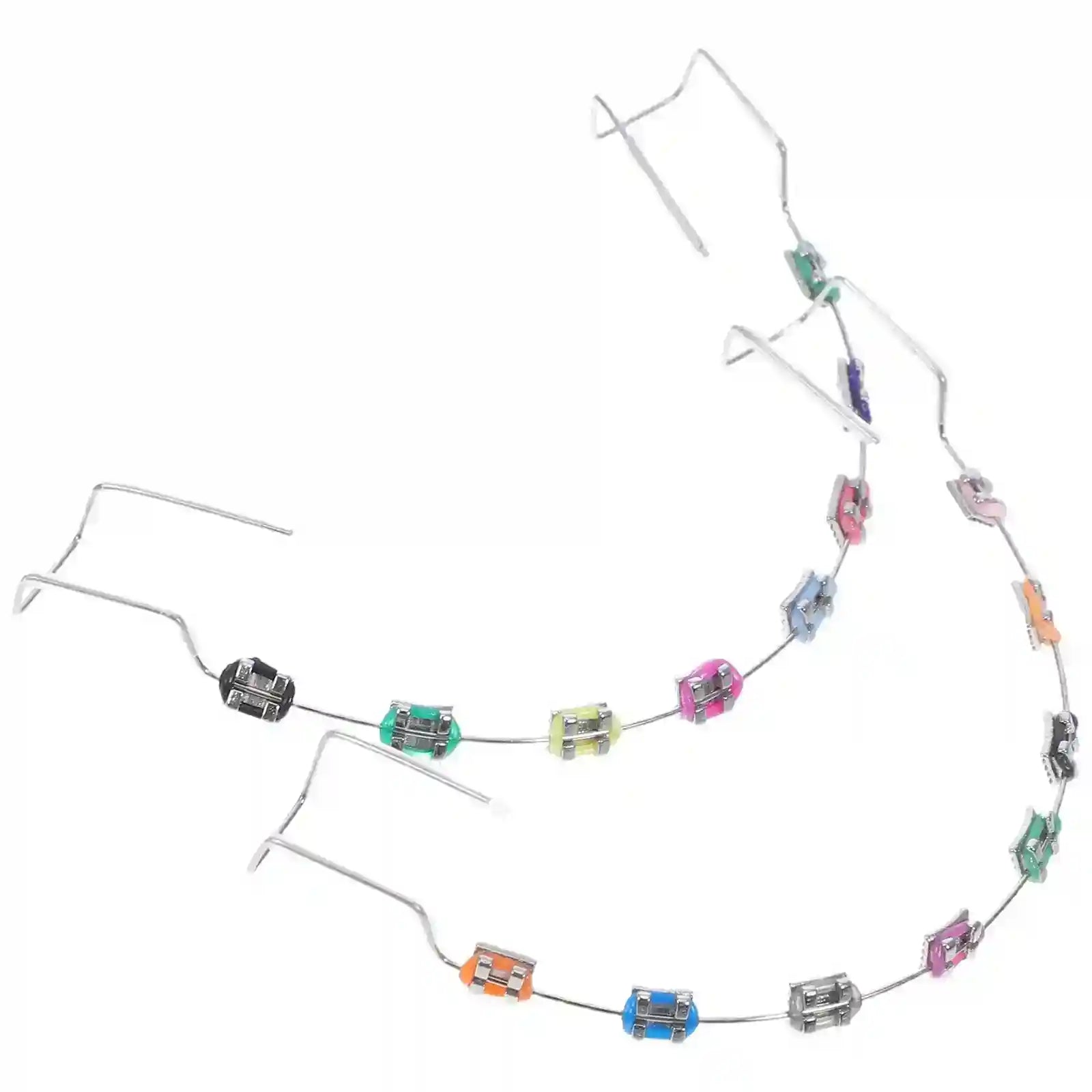 Metal brackets, chain ties, and arch wire applied to teeth correction model for training.