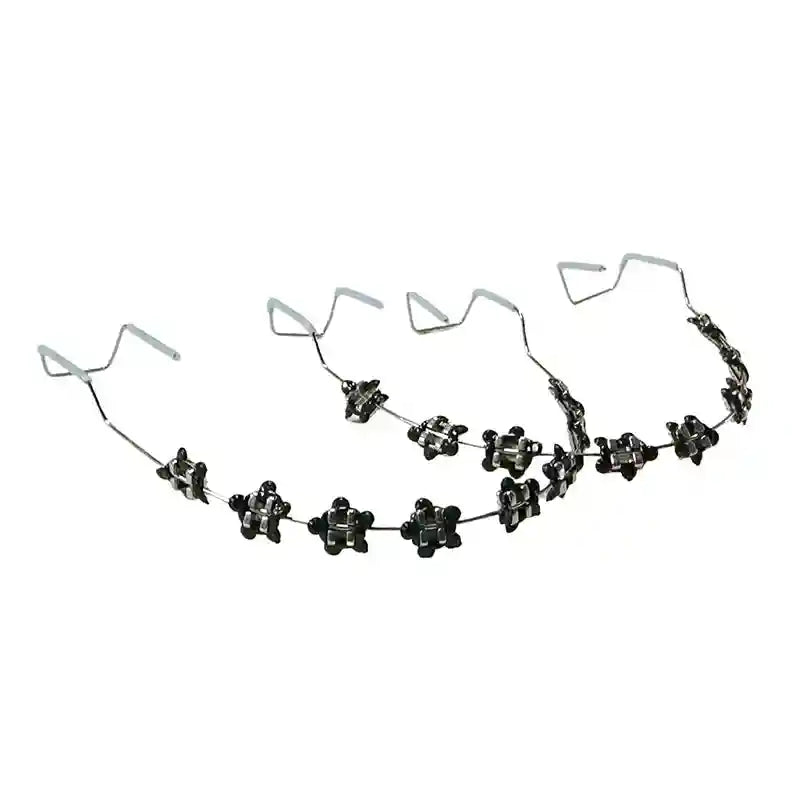 Wearing colorful fake braces for a fun, fashionable look at a photoshoot or party.