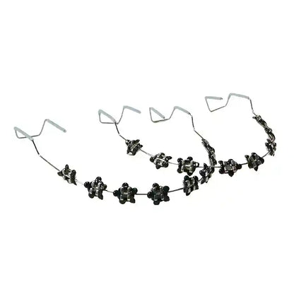 Wearing colorful fake braces for a fun, fashionable look at a photoshoot or party.