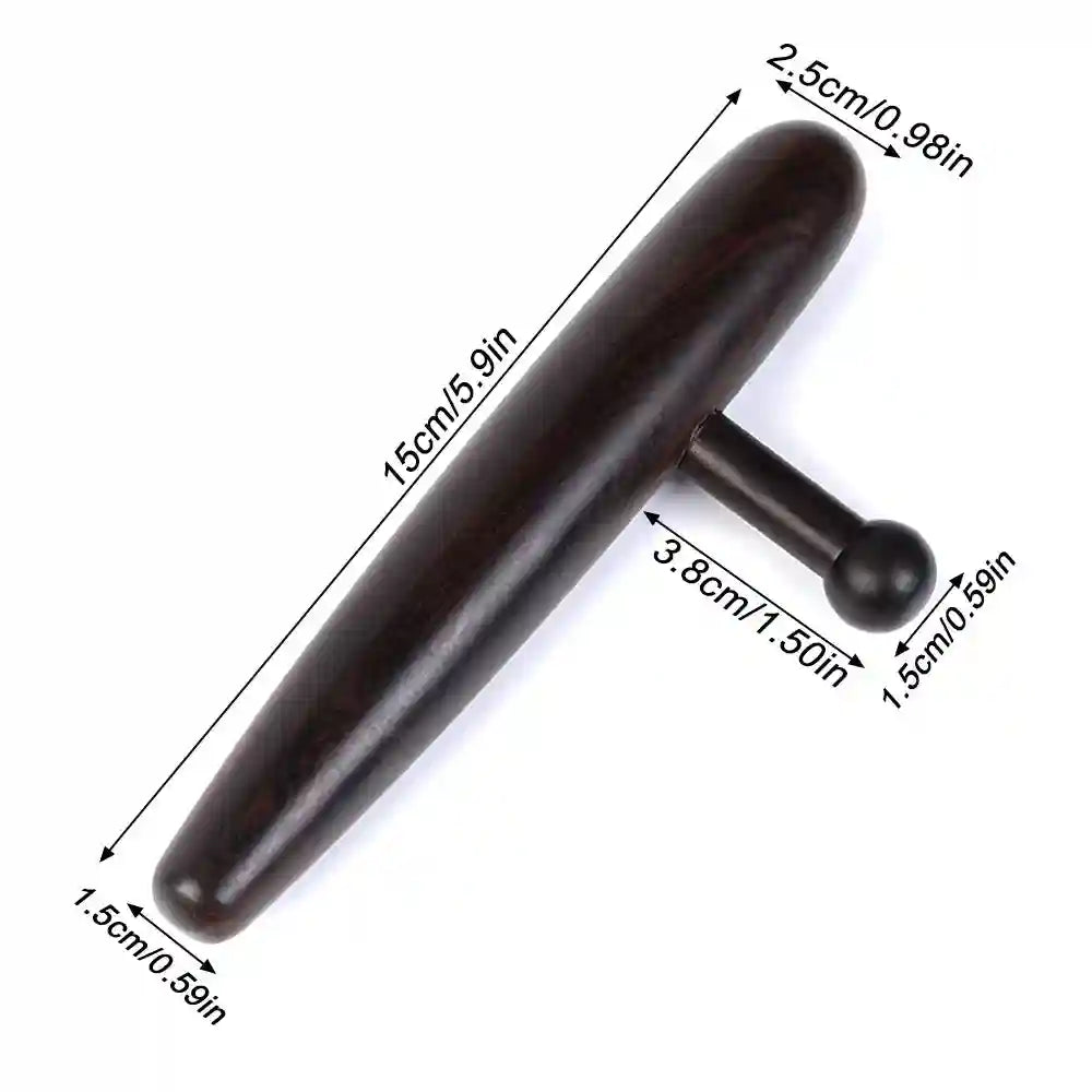 Professional massage therapist using the deep tissue tool to relieve tension in a client’s back.