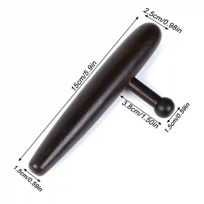 Professional massage therapist using the deep tissue tool to relieve tension in a client’s back.