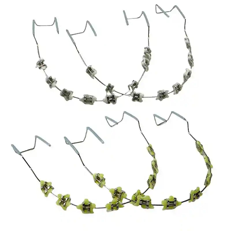 Wearing colorful fake braces for a fun, fashionable look at a photoshoot or party.