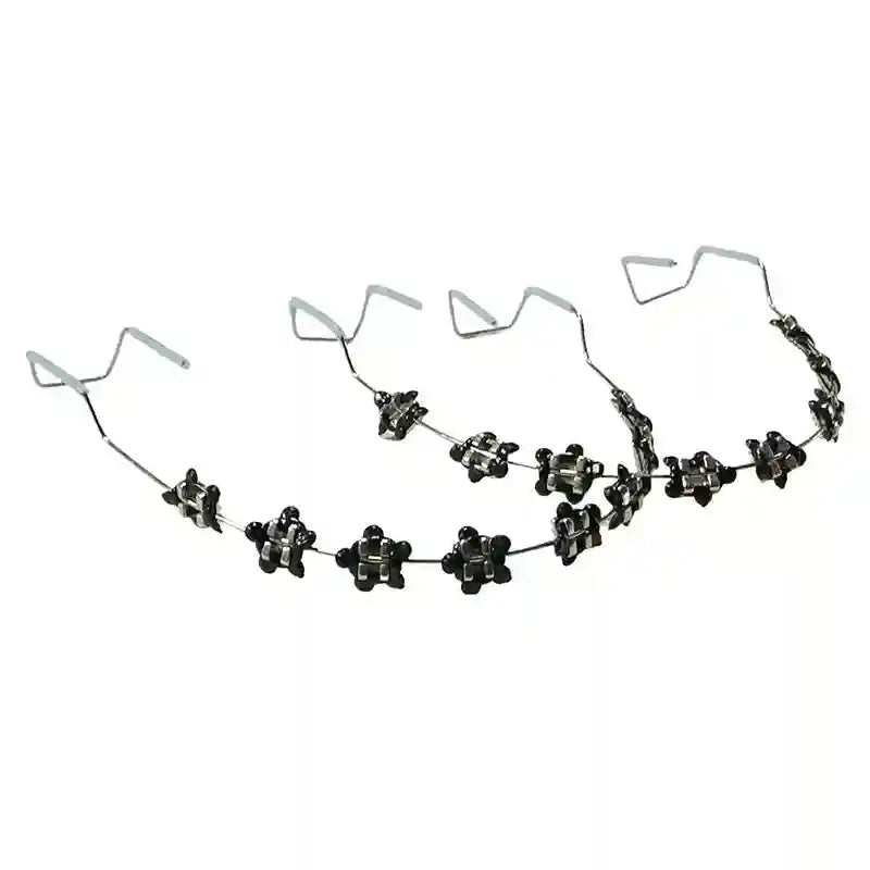 Wearing colorful fake braces for a fun, fashionable look at a photoshoot or party.