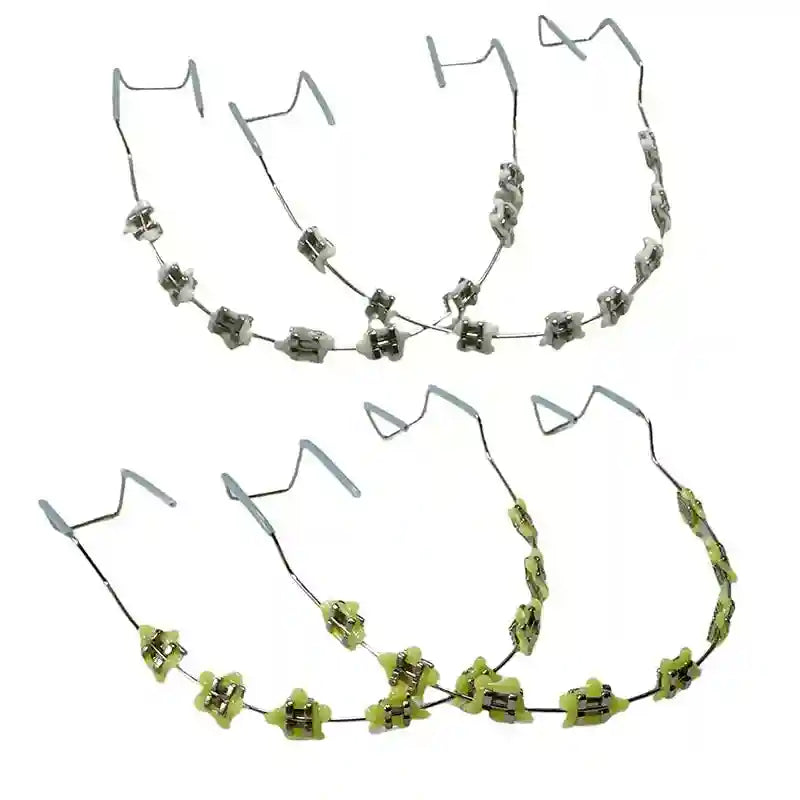 Wearing colorful fake braces for a fun, fashionable look at a photoshoot or party.